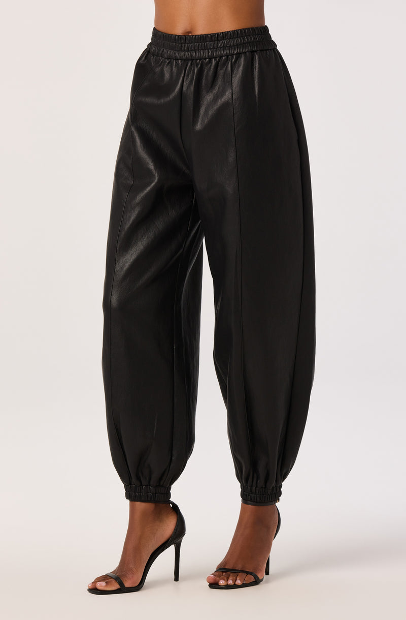 Black faux leather jogger pants with elastic waist and cuffs.