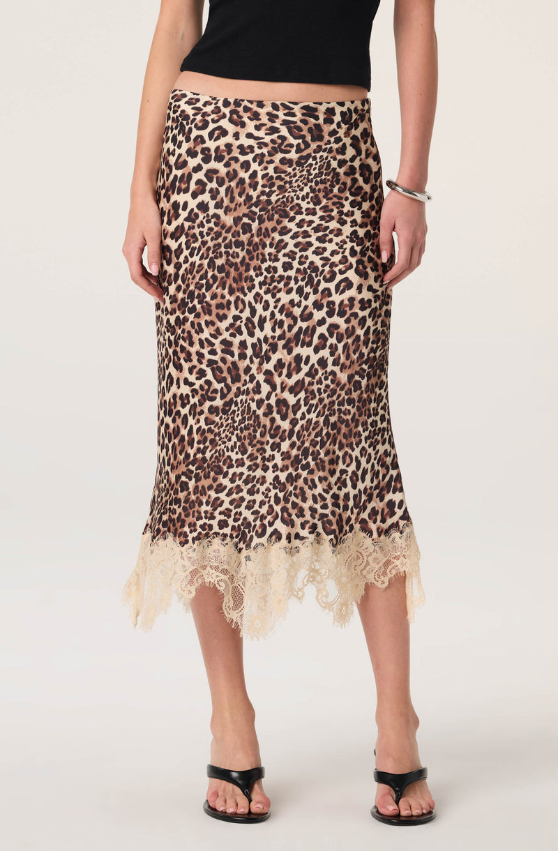Leopard print midi skirt with beige lace hem, paired with a black top.