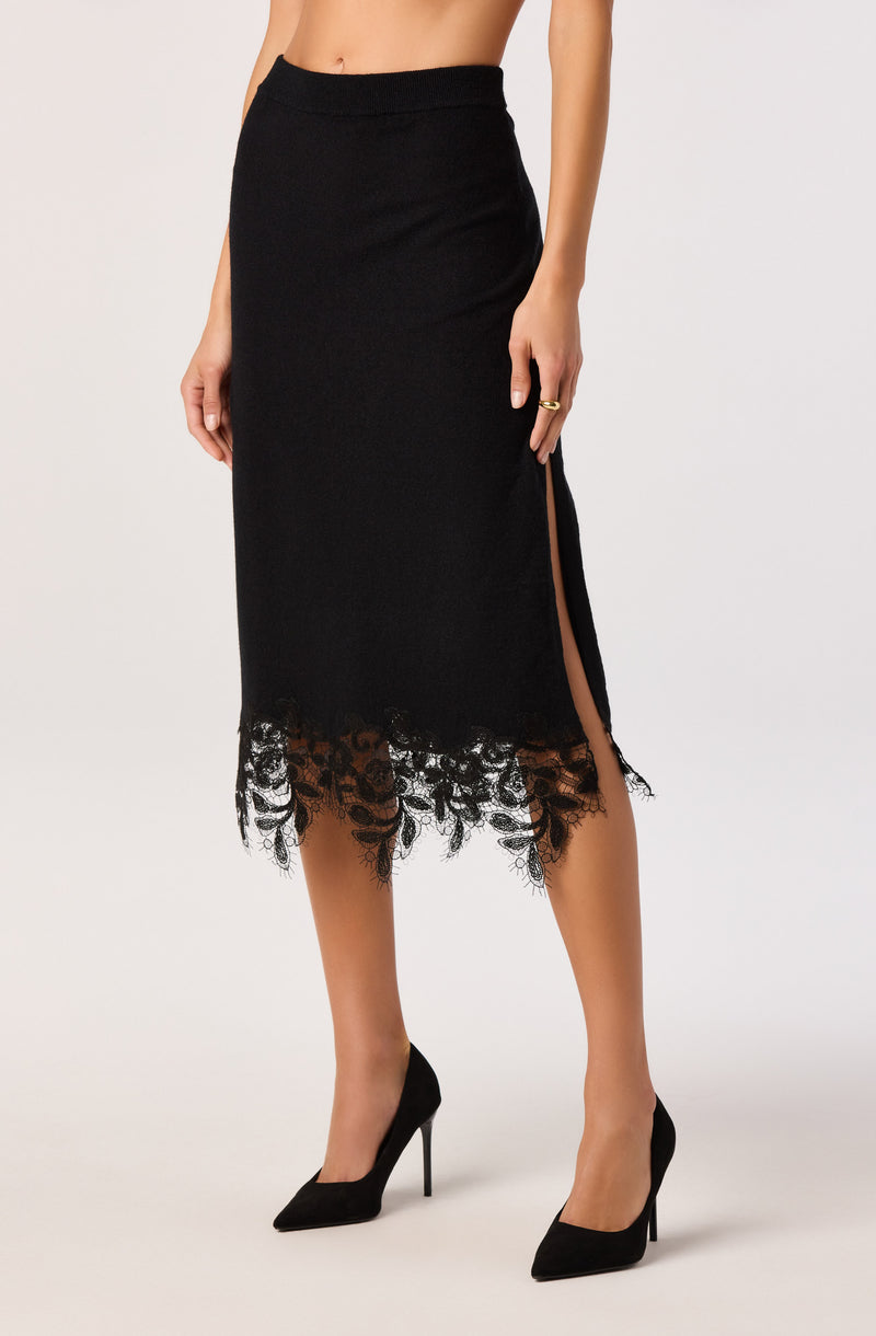 Black mid-length skirt with lace hem and side slit.