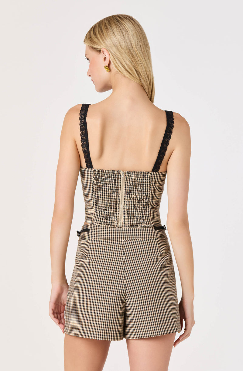 Gingham romper with black lace straps and a back zipper.