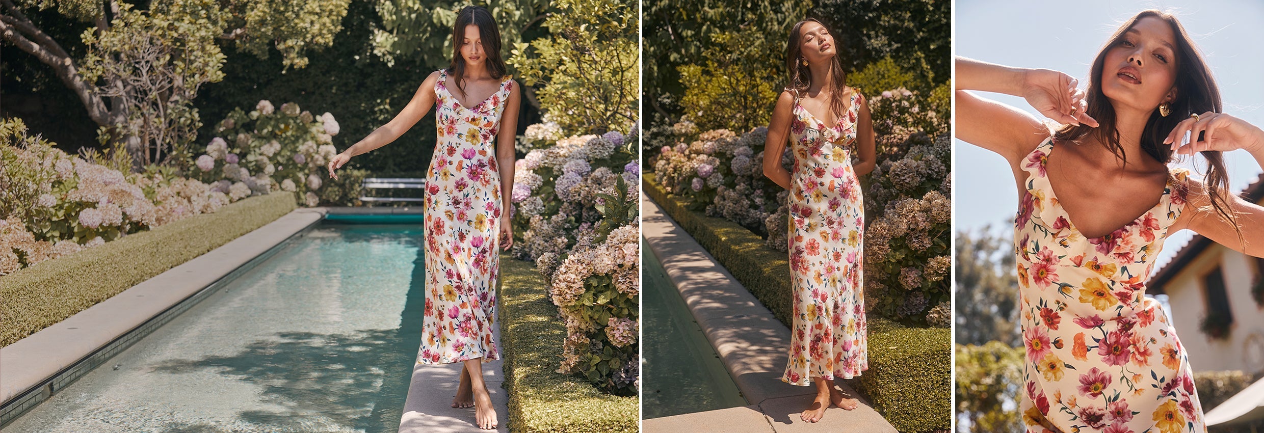 Woman in a floral dress standing by a pool with garden scenery
