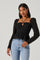 Toni Ruched Halter Long Sleeve Peplum Top