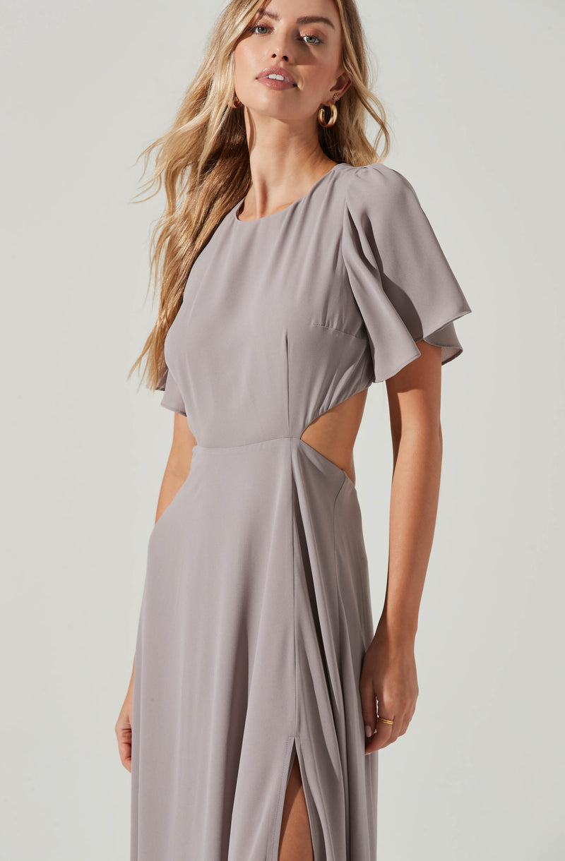 Grey Highneck Dress - This dress is surely one of the more fashion forward options for your wardrobe. It emphasizes a slender highneck.